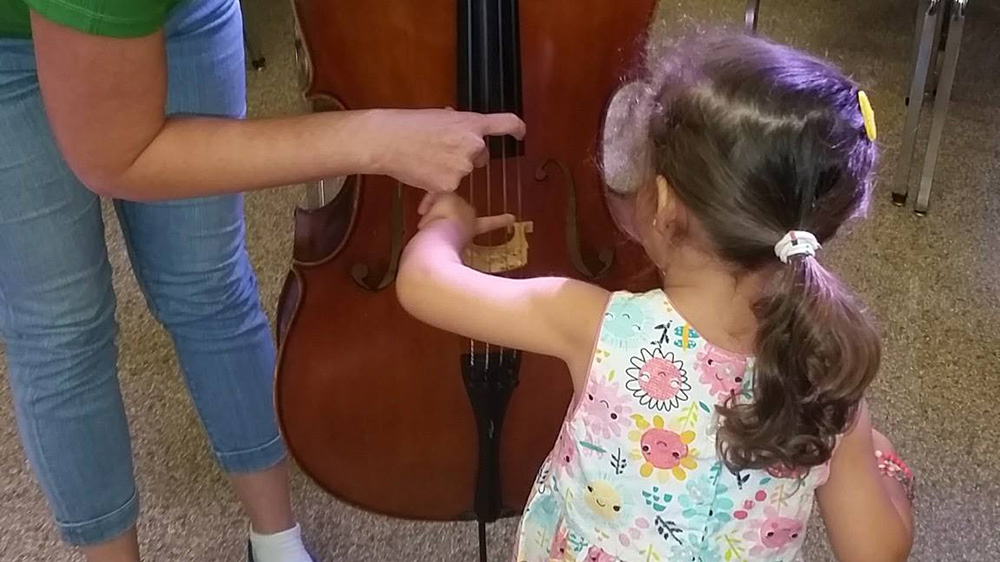 student learns about a new instrument